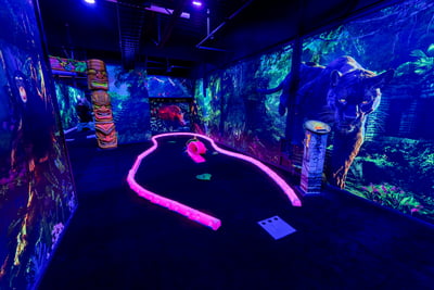 Golf in the Glow: Exciting Glow-in-the-Dark Mini Putt at AeroSports St. Catharines at AeroSports St Catharines indoor trampoline park